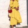 woman-wearing-off-shoulder-oversized-pleated-long-sleeve-midi-dress