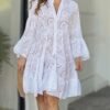 woman-wearing-vintage-embroidered-solid-v-neck-loose-sexy-mini-dress