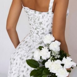 woman-wearing-floral-split-dress-with-adjustable-straps