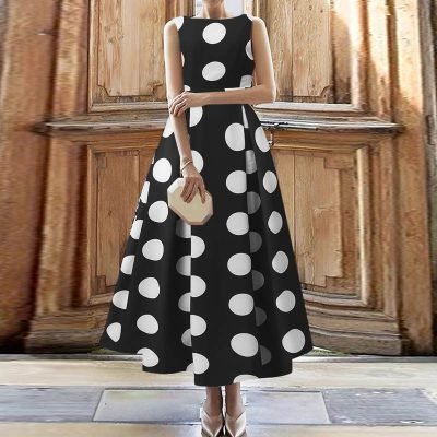 woman-wearing-sleeveless-polka-dot-pleated-dress