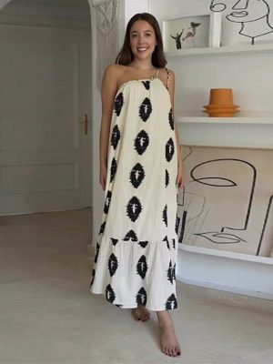 woman-wearing-one-shoulder-printed-sleeveless-dress