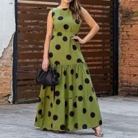 woman-wearing-sleeveless-polka-dot-pleated-dress