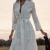 woman-wearing-embroidered-chic-lapel-long-sleeve-maxi-dress