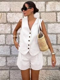 woman-wearing-vintage-solid-v-neck-top-shorts