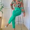 woman-wearing-printed-long-sleeve-blouse-shirt-and-pants