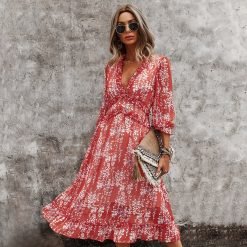 woman-wearing-v-neck-butterfly-sleeve-floral-dress