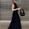 woman-wearing-solid-sleeveless-tassel-long-a-line-dress