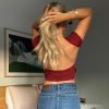 woman-wearing-sexy-solid-color-backless-crop-top