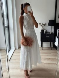 woman-wearing-sleeveless-hollow-out-white-belt-long-dress