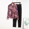 woman-wearing-printed-long-sleeve-blouse-shirt-and-pants