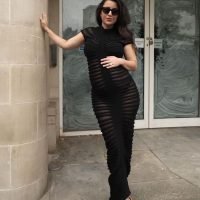 woman-wearing-knitted-shorts-sleeve-striped-see-through-dress