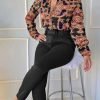 woman-wearing-printed-long-sleeve-blouse-shirt-and-pants