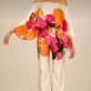 woman-wearing-printed-satin-sleeve-off-shoulder-and-pants-set