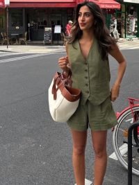 woman-wearing-vintage-solid-v-neck-top-shorts